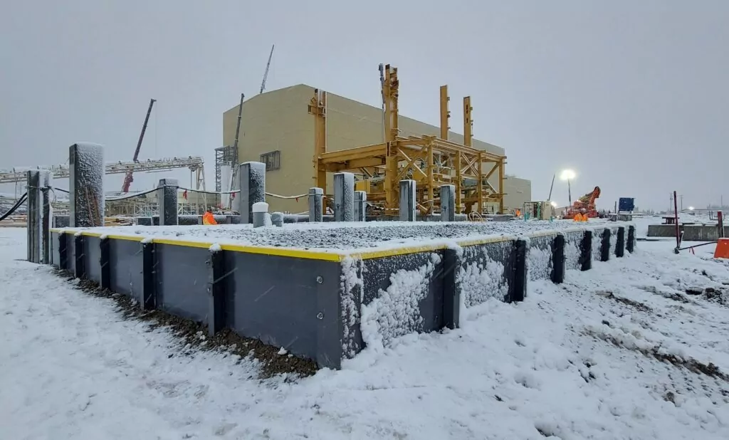 Albarrie's Secondary Containment System installation during snowfall.