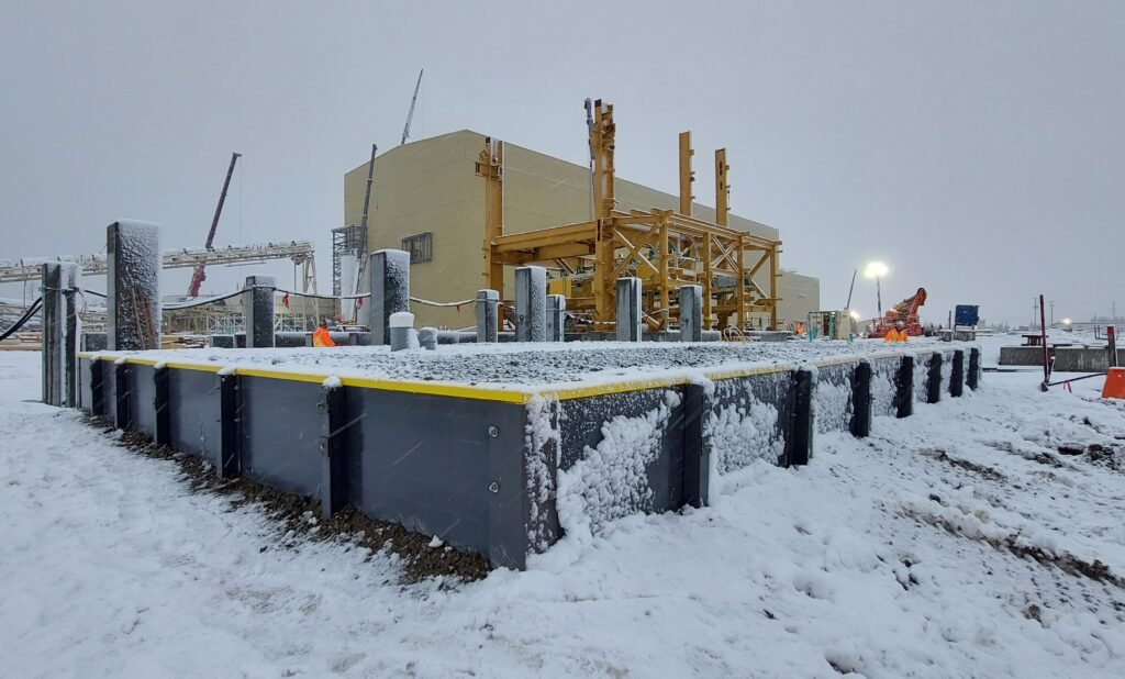 Albarrie's Secondary Containment System installation during snowfall.